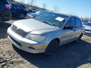 2002 Mitsubishi Lancer ES with VIN JA3AJ26E52U022764, listed as a IAAI auction lot 41763763 with 120,493 mi miles. Bid and sale history available at carsss.com. Image 2.