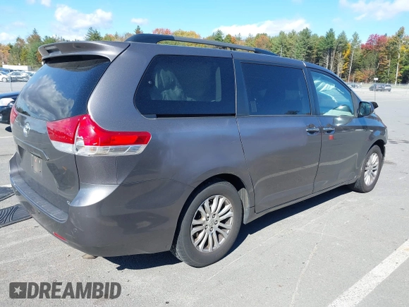 2014 Toyota Sienna XLE with VIN 5TDYK3DC1ES472036, listed as a IAAI auction lot 40546573 with 134,907 mi miles and . Bid and sale history available at DreamBid. Image 4.