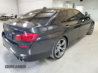 2013 BMW M5 z VIN WBSFV9C5XDC772672, wystawiony jako Copart lot #53732175 z przebiegiem 83 665 mil mil oraz Tytuł czysty. Historia ofert i sprzedaży dostępna na DreamBid. Obrazek 3.