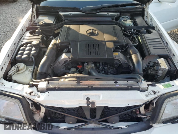 1997 Mercedes-Benz SL 500 with VIN WDBFA67FXVF149930, listed as a Copart auction lot 64749525 with 88,523 mi miles and Salvage title. Bid and sale history available at DreamBid. Image 11.