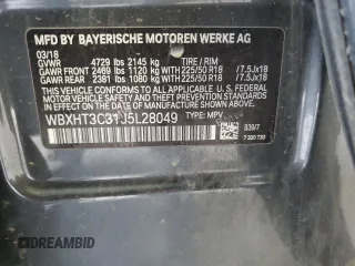2018 BMW X1 xDrive28i z VIN WBXHT3C31J5L28049, wystawiony jako Copart lot #57496465 z przebiegiem 117 591 mil mil oraz Czysty tytuł • Clean title. Historia ofert i sprzedaży dostępna na DreamBid. Obrazek 13.