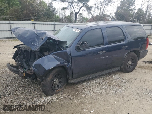 2014 Chevrolet Tahoe Commercial with VIN 1GNLC2E08ER209599, listed as a Copart auction lot 51018165 with 111,585 mi miles and Salvage title. Bid and sale history available at DreamBid. Image 1.
