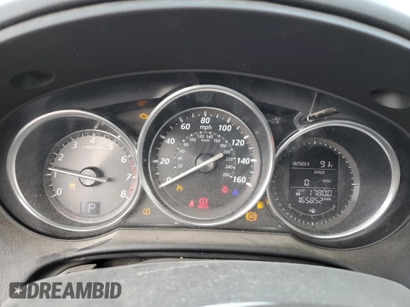 2015 Mazda CX-5 Touring with VIN JM3KE4CY0F0517821, listed as a Copart auction lot 53937195 with 165,852 mi miles and Salvage Title. Bid and sale history available at DreamBid. Image 9.