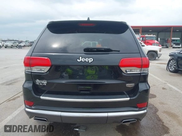 2015 Jeep Grand Cherokee Summit z VIN 1C4RJFJT0FC674494, wystawiony jako IAAI lot #42056835 z przebiegiem 143 969 mil mil oraz . Historia ofert i sprzedaży dostępna na DreamBid. Obrazek 17.