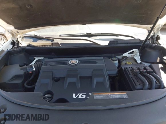 2014 Cadillac SRX Performance Collection with VIN 3GYFNFE35ES582897, listed as a IAAI auction lot 41978361 with 144,116 mi miles and . Bid and sale history available at DreamBid. Image 10.