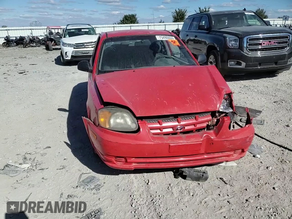 2003 Hyundai Accent with VIN KMHCF35C33U255489, listed as a Copart auction lot 75490604 with 219,457 mi miles and Salvage Title. Bid and sale history available at carsss.com. Image 11.