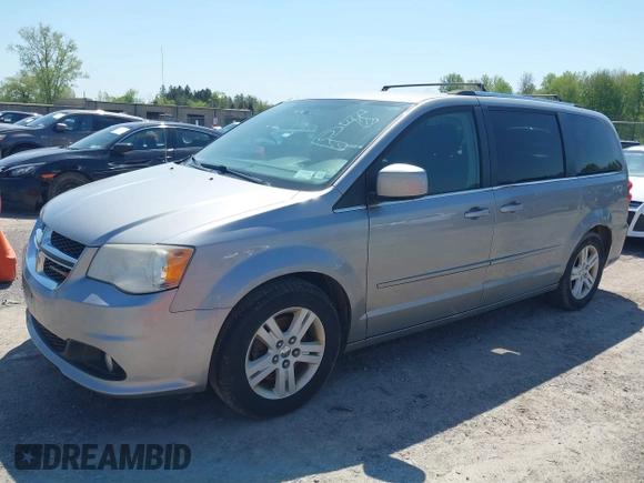 2013 Dodge Grand Caravan Crew with VIN 2C4RDGDG1DR800538, listed as a IAAI auction lot 42211140 with 138,647 mi miles and . Bid and sale history available at DreamBid. Image 2.
