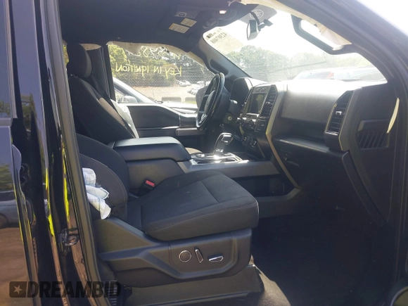 2018 Ford F-150 XL with VIN 1FTEW1EP2JFD51393, listed as a IAAI auction lot 42307408 with 141,478 mi miles and . Bid and sale history available at DreamBid. Image 5.