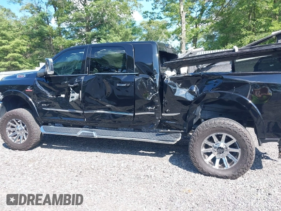 2022 Ram 2500 Limited with VIN 3C6UR5TLXNG377875, listed as a IAAI auction lot 42610178 with 46,390 mi miles and . Bid and sale history available at DreamBid. Image 14.
