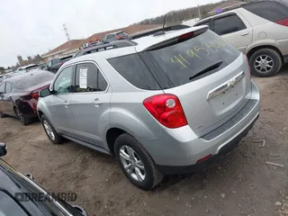 2015 Chevrolet Equinox LT z VIN 2GNFLFEK5F6341898, wystawiony jako IAAI lot #41953065 z przebiegiem 148 017 mil mil oraz . Historia ofert i sprzedaży dostępna na DreamBid. Obrazek 3.