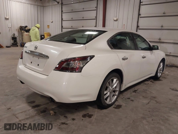 2014 Nissan Maxima S with VIN 1N4AA5AP1EC439827, listed as a IAAI auction lot 41847464 with 135,205 mi miles and . Bid and sale history available at DreamBid. Image 4.