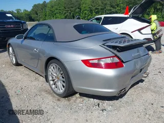 2006 Porsche 911 Carrera S z VIN WP0CB29976S766616, wystawiony jako IAAI lot #42119525 z przebiegiem 57 164 mil mil oraz . Historia ofert i sprzedaży dostępna na DreamBid. Obrazek 3.