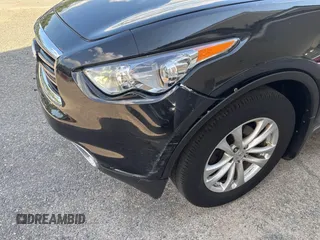 2014 Infiniti QX70 with VIN JN8CS1MW1EM411715, listed as a IAAI auction lot 42769793 with 180,472 mi miles and . Bid and sale history available at DreamBid. Image 6.