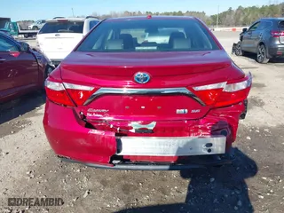 2015 Toyota Camry Hybrid LE with VIN 4T1BD1FK6FU170534, listed as a IAAI auction lot 41211638 with 120,059 mi miles. Bid and sale history available at carsss.com. Image 16.