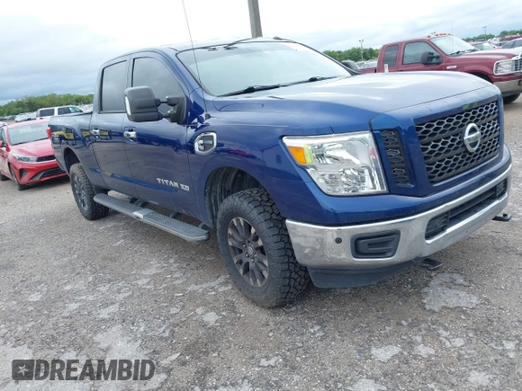 2019 Nissan Titan XD SV with VIN 1N6BA1F46KN514637, listed as a IAAI auction lot 41986617 with 123,872 mi miles. Bid and sale history available at carsss.com. Image 1.