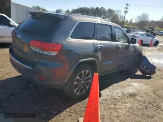2017 Jeep Grand Cherokee Overland with VIN 1C4RJECGXHC696676, listed as a Copart auction lot 86885924 with 154,754 mi miles and Salvage Title. Bid and sale history available at carsss.com. Image 3.