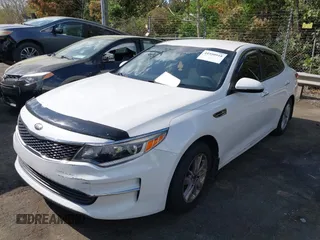 2016 Kia Optima LX with VIN KNAGT4L37G5074853, listed as a IAAI auction lot 41950918 with 151,111 mi miles. Bid and sale history available at carsss.com. Image 17.