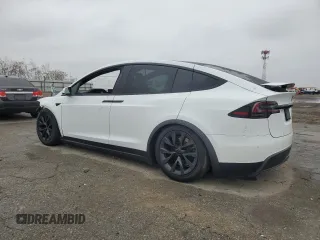 2023 Tesla Model X with VIN 7SAXCAE58PF379943, listed as a Copart auction lot 86352354 with Not Provided miles and Salvage Title. Bid and sale history available at DreamBid. Image 2.