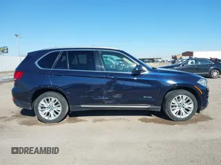 2016 BMW X5 sDrive35i with VIN 5UXKR2C55G0R71330, listed as a IAAI auction lot 41661140 with 128,457 mi miles. Bid and sale history available at carsss.com. Image 13.