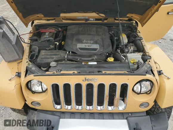 2014 Jeep Wrangler Sahara with VIN 1C4AJWBG8EL144691, listed as a Copart auction lot 71172514 with 111,322 mi miles and Salvage title. Bid and sale history available at DreamBid. Image 12.