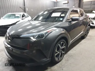 2019 Toyota C-HR XLE z VIN NMTKHMBX3KR083103, wystawiony jako IAAI lot #41935669 z przebiegiem 39 841 mil mil oraz . Historia ofert i sprzedaży dostępna na DreamBid. Obrazek 18.