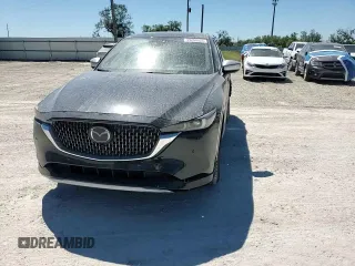 2024 Mazda CX-5 2.5 Turbo Signature with VIN JM3KFBXY2R0354346, listed as a Copart auction lot 49260525 with 9,571 mi miles and Salvage Title. Bid and sale history available at carsss.com. Image 12.