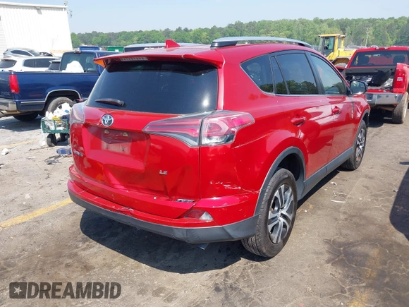 2016 Toyota RAV4 LE with VIN JTMZFREV1GJ098247, listed as a IAAI auction lot 42065800 with 199,172 mi miles and . Bid and sale history available at DreamBid. Image 4.
