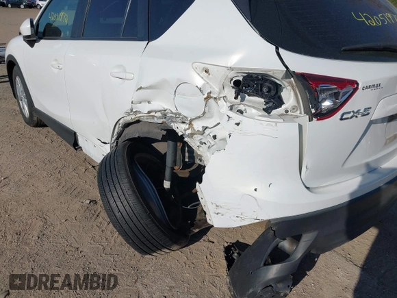 2014 Mazda CX-5 Sport with VIN JM3KE2BE8E0301175, listed as a IAAI auction lot 42051972 with 121,821 mi miles and . Bid and sale history available at carsss.com. Image 6.