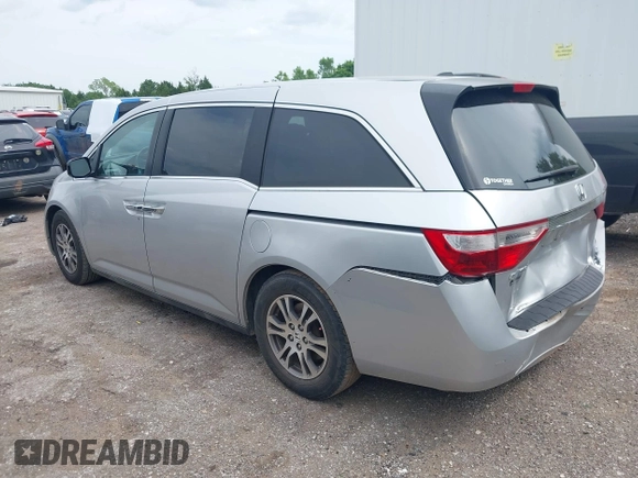 2012 Honda Odyssey EX-L with VIN 5FNRL5H66CB081323, listed as a IAAI auction lot 42465110 with 266,934 mi miles and . Bid and sale history available at DreamBid. Image 14.
