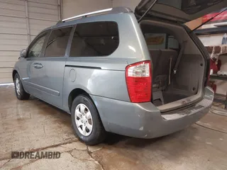 2009 Kia Sedona LX with VIN KNDMB233X96276905, listed as a IAAI auction lot 41394768 with 231,156 mi miles. Bid and sale history available at carsss.com. Image 3.