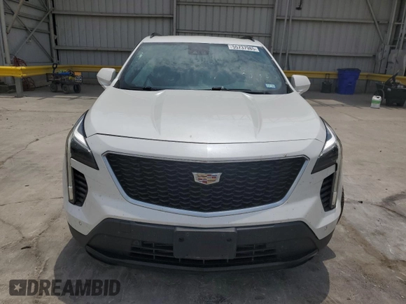 2020 Cadillac XT4 FWD Sport with VIN 1GYFZER49LF123830, listed as a Copart auction lot 55737985 with 98,871 mi miles and Salvage title. Bid and sale history available at DreamBid. Image 5.