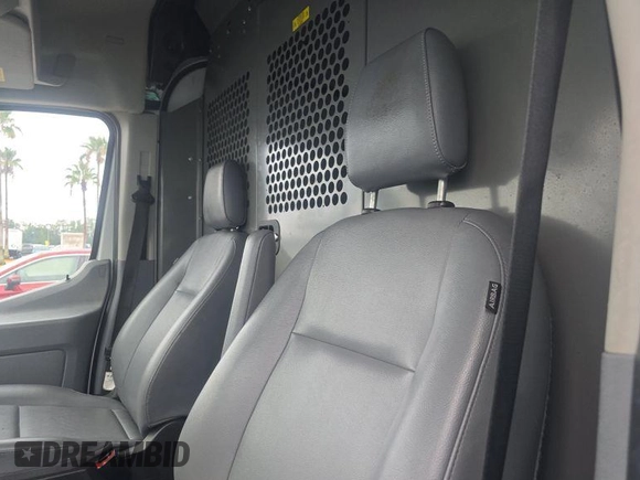 2019 Ford Transit with VIN 1FTYR2CM9KKB04450, listed as a IAAI auction lot 42849742 with 222,192 mi miles and . Bid and sale history available at DreamBid. Image 26.