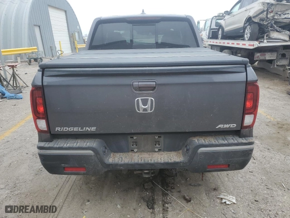 2020 Honda Ridgeline RTL-E with VIN 5FPYK3F73LB005001, listed as a Copart auction lot 86960494 with 39,714 mi miles and Salvage Title. Bid and sale history available at carsss.com. Image 6.