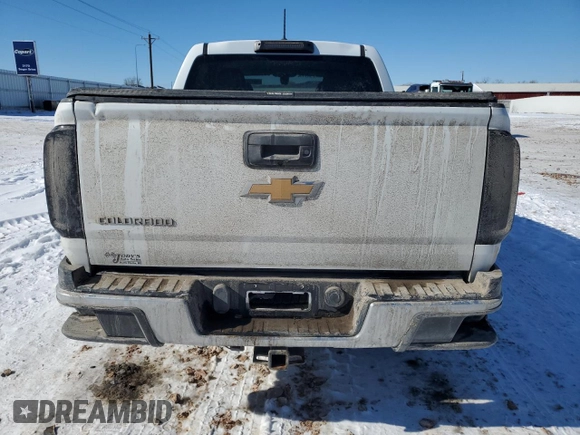 2015 Chevrolet Colorado 4WD WT with VIN 1GCGTAE36F1226934, listed as a Copart auction lot 45426775 with 97,396 mi miles and Salvage Title. Bid and sale history available at DreamBid. Image 6.