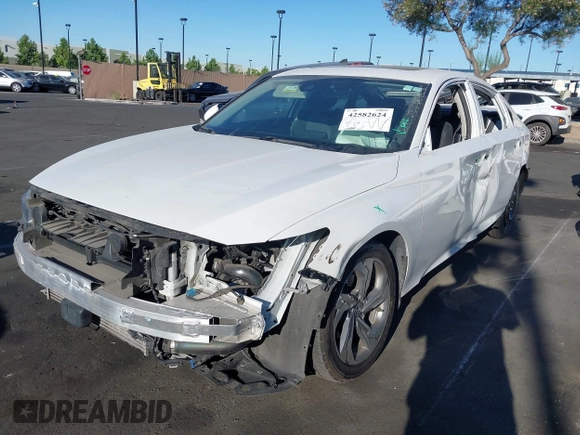 2020 Honda Accord EX with VIN 1HGCV1F4XLA004944, listed as a IAAI auction lot 42582624 with 69,558 mi miles and . Bid and sale history available at DreamBid. Image 2.