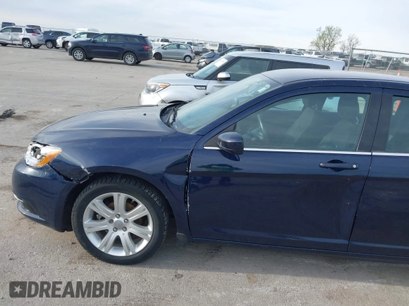 2014 Chrysler 200 Touring with VIN 1C3CCBBB2EN128771, listed as a IAAI auction lot 42148625 with 77,848 mi miles and . Bid and sale history available at DreamBid. Image 12.