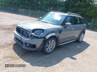 2020 MINI Countryman Cooper with VIN WMZYW5C03L3L14724, listed as a IAAI auction lot 42478285 with 57,915 mi miles and . Bid and sale history available at DreamBid. Image 2.
