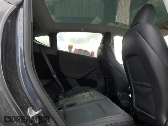 2024 Tesla Model Y Long Range with VIN 7SAYGDEE4RA316722, listed as a Copart auction lot 53207395 with 17,006 mi miles and Salvage title. Bid and sale history available at DreamBid. Image 11.