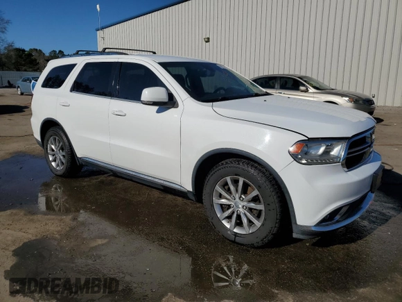 2014 Dodge Durango Limited with VIN 1C4SDHDT8EC348974, listed as a Copart auction lot 88202005 with 189,877 mi miles and Salvage title. Bid and sale history available at DreamBid. Image 4.