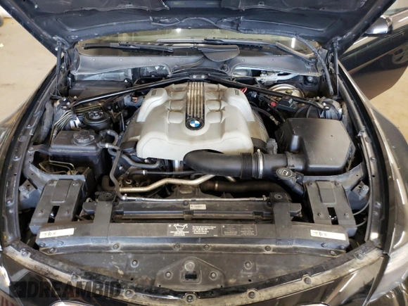 2004 BMW 6 Series 645Ci z VIN WBAEK73414B321589, wystawiony jako Copart lot #54207984 z przebiegiem 127 936 mil mil oraz Szkoda całkowita • Salvage title. Historia ofert i sprzedaży dostępna na DreamBid. Obrazek 11.
