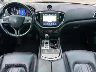 2015 Maserati Ghibli z VIN ZAM57XSA2F1159438, wystawiony jako Copart lot #49187735 z przebiegiem 73 996 mil mil oraz Szkoda całkowita • Salvage title. Historia ofert i sprzedaży dostępna na DreamBid. Obrazek 6.