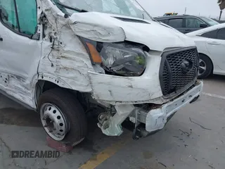 2022 Ford Transit Cargo with VIN 1FTBF4XG3NKA44975, listed as a IAAI auction lot 42161004 with 40,682 mi miles and . Bid and sale history available at DreamBid. Image 6.