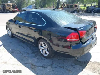 2012 Volkswagen Passat SE with VIN 1VWBP7A30CC025468, listed as a IAAI auction lot 41817638 with 204,508 mi miles. Bid and sale history available at carsss.com. Image 3.