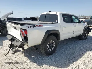 2021 Toyota Tacoma SR z VIN 3TMCZ5AN8MM387166, wystawiony jako Copart lot #49952935 z przebiegiem 63 175 mil mil oraz Szkoda całkowita • Salvage title. Historia ofert i sprzedaży dostępna na DreamBid. Obrazek 3.