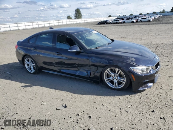 2015 BMW 4 Series 435i xDrive with VIN WBA4B3C51FGV48817, listed as a Copart auction lot 52997265 with 77,812 mi miles and Salvage Title. Bid and sale history available at DreamBid. Image 4.