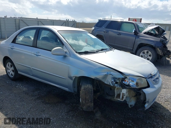 2004 Kia Spectra LX with VIN KNAFE122645052206, listed as a IAAI auction lot 41767864 with 63,866 mi miles. Bid and sale history available at carsss.com. Image 1.