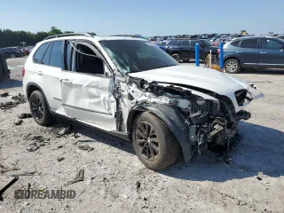 2011 BMW X5 35d с VIN 5UXZW0C58BL369718, выставлен на аукционе Copart как лот 54735695 с пробегом 199 303 миль миль и Списание • Salvage title. История ставок и продаж доступна на DreamBid. Изображение 4.