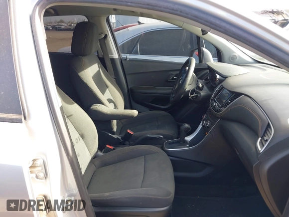 2022 Chevrolet Trax LS with VIN KL7CJKSMXNB555858, listed as a IAAI auction lot 41535285 with 75,468 mi miles and . Bid and sale history available at DreamBid. Image 5.