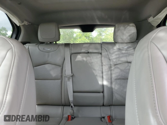 2020 Cadillac XT4 FWD Premium Luxury with VIN 1GYFZCR46LF113499, listed as a Copart auction lot 57534205 with 64,859 mi miles and Salvage title. Bid and sale history available at DreamBid. Image 10.