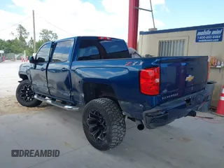 2018 Chevrolet Silverado 1500 LT with VIN 3GCUKREC0JG366590, listed as a IAAI auction lot 42045634 with 92,989 mi miles. Bid and sale history available at carsss.com. Image 3.